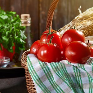 bigstock-Ripe-Red-Tomatoes-In-A-Basket--389192803.jpg