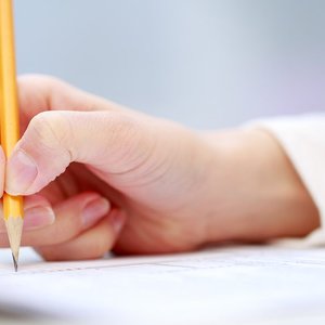 bigstock-Female-hand-writing-close-up-87576485.jpg